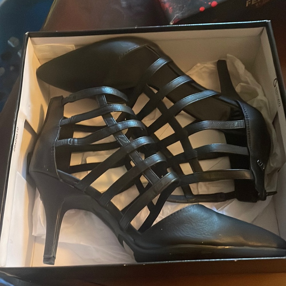 Black leather pumps